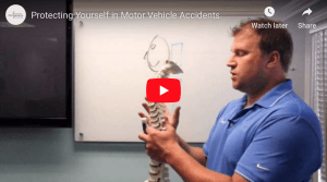 Chiropractor discussing how to protect yourself in a car accident