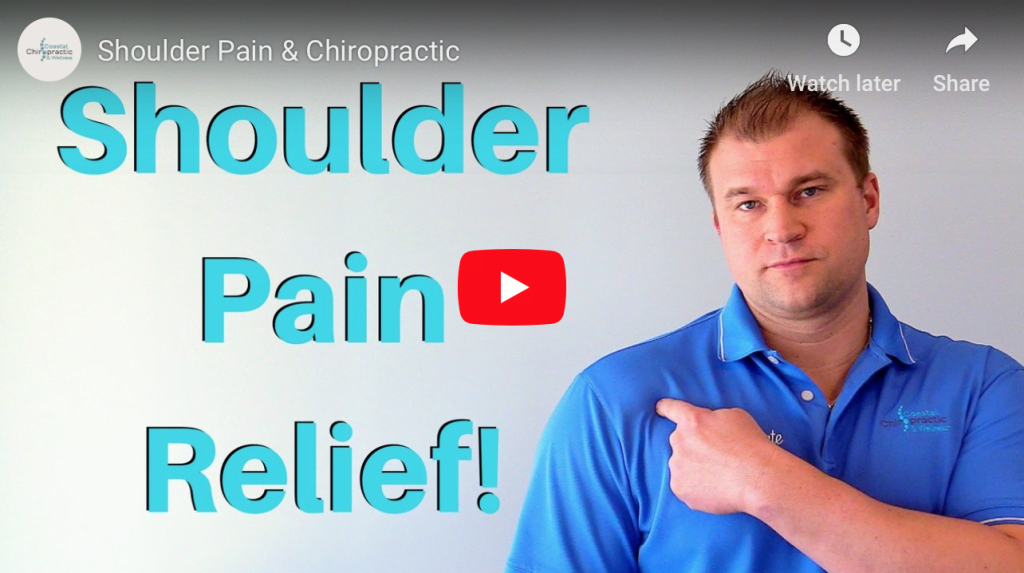 Chiropractor discussing shoulder pain relief